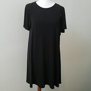 Calvin Klein black dress. 4